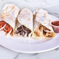 Tacos Arabes · Small flour tortilla with grilled onions, melted cheese & chipotle sauce.