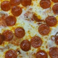 Meat Lover Pizza · A meat lover's paradise-Loaded with pepperoni, homemade sausage, bacon, and ham. Topped with...