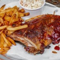 Half Slab Ribs And Fries · Half slab of tender Ribs smothered in our tangy BBQ sauce. Served with your choice of fries ...
