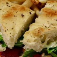 Chicken Focaccia · Grilled tender chicken, fresh ripe tomatoes, sweet roasted red bell peppers, Swiss cheese, p...
