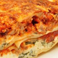 Lasagna · An Italian classic! Our lasagna comes in a meat or vegetarian. Filled with a creamy herb che...