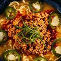 Spicy Ramen · Spicy: packed with flavor and notes of sesame. This dish is the spice of tamashii. Topped wi...
