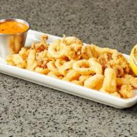Calamari · Lightly hand-breaded, served with sweet chili sauce.