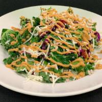 Emerald Kale Salad · Aged Manchego, dried cranberries, green onion, sunflower seeds, fresh mint,  cilantro vinaig...