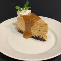 Peanut Butter Pie · Homemade brownie crumb crust filled with creamy, rich peanut butter filling topped with a pe...