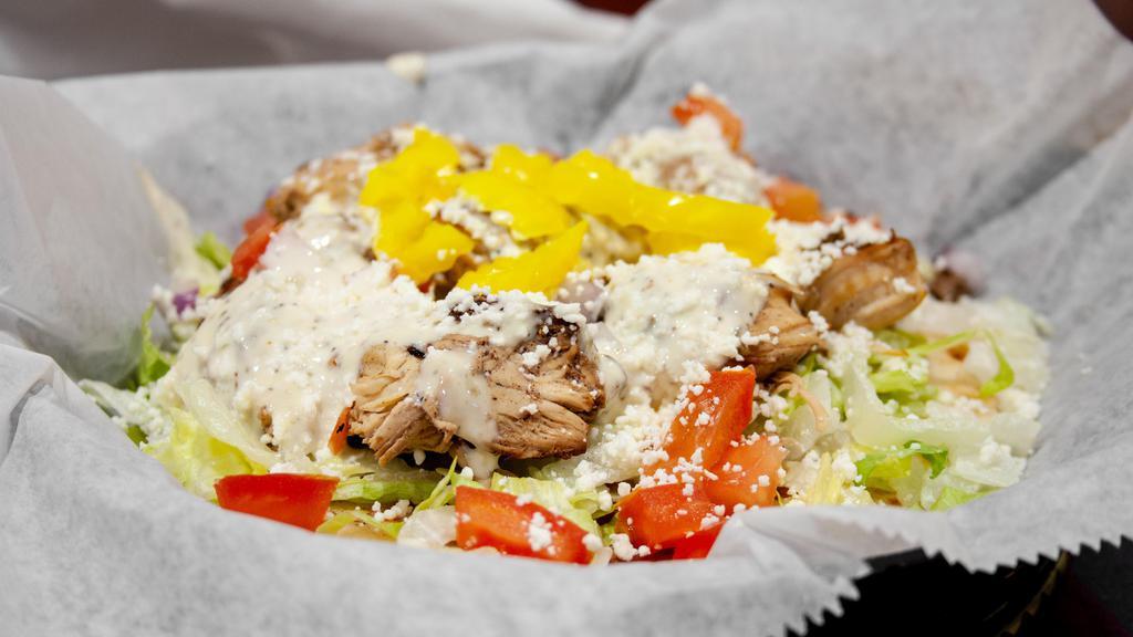 Chicken Gyro · Marinated, grilled chicken tenderloin served on warm pita bread with lettuce, tomato, onion, banana peppers and our house dressing.