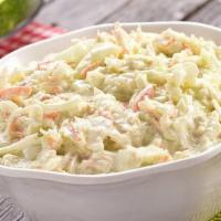 Cole Slaw · Creamy, crunchy coleslaw made with chopped cabbage blended with our signature dressing.