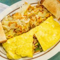 Farmers’ Omelette · Ham, green peppers, onions, cheese & hash browns inside