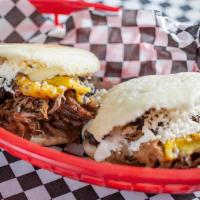 El Pabellon Arepas · The Venezuelan National Dish. Brisket, Sweet Plantains, Queso Fresco, and Cremita

Made with...