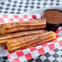 Churros · Served with Chocolate Dipping Sauce
