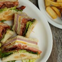 Club House · Ham, bacon, lettuce, tomato and mayo on three slices of toast.