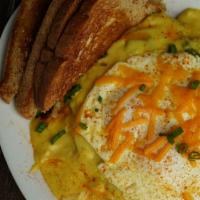 Cajun Breakfast · Two Eggs, onions, mushrooms and Green peppers served on Hashbrowns topped with Hollandaise s...