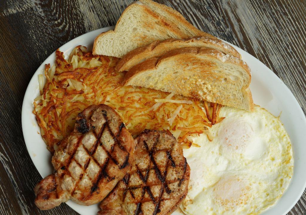 Pork Chop & Eggs · Pork chop, two large eggs. Served with hashbrowns toast and jelly.