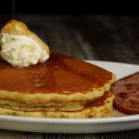 Three Buttermilk Pancakes · Served with your choice of bacon, sausage (link or patty) or ham, whipped butter and syrup.