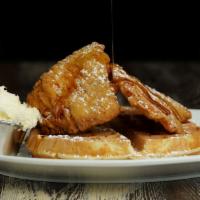 Southern Chicken N' Waffles · Classic belgian waffle topped with two breaded chicken breasts, served with a side of warm c...