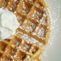 Classic Belgian Waffle · Topped with powdered sugar.