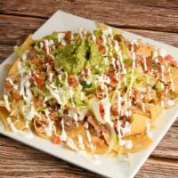 Nachos · Chips covered with beans, mozzarella cheese and your choice of meat. Topped with pico de gal...
