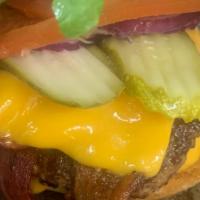 Oinkymoo · 1/3 LB Angus beef patty and bacon with your choice of cheese and your choice of toppings on ...