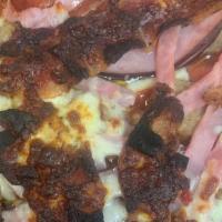 Meat Madness Pizza · Pepperoni + Sliced Ham + Bacon + Sausage