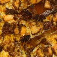 Nashville Hot Chicken Bacon Pizza · House Nashville Hot Sauce + Crispy Chicken + Bacon + Mozzarella Cheese Blend