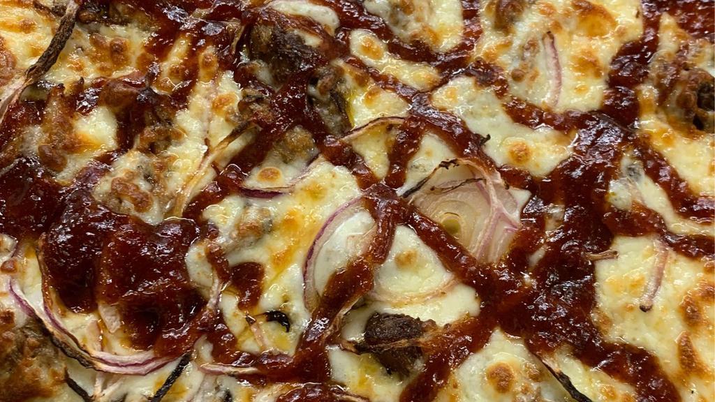 Pulled Pork Pizza · Your Choice of either Memphis Sweet BBQ Sauce or Carolina Gold Sauce and of course, pulled pork, mozzarella cheese and red onions.