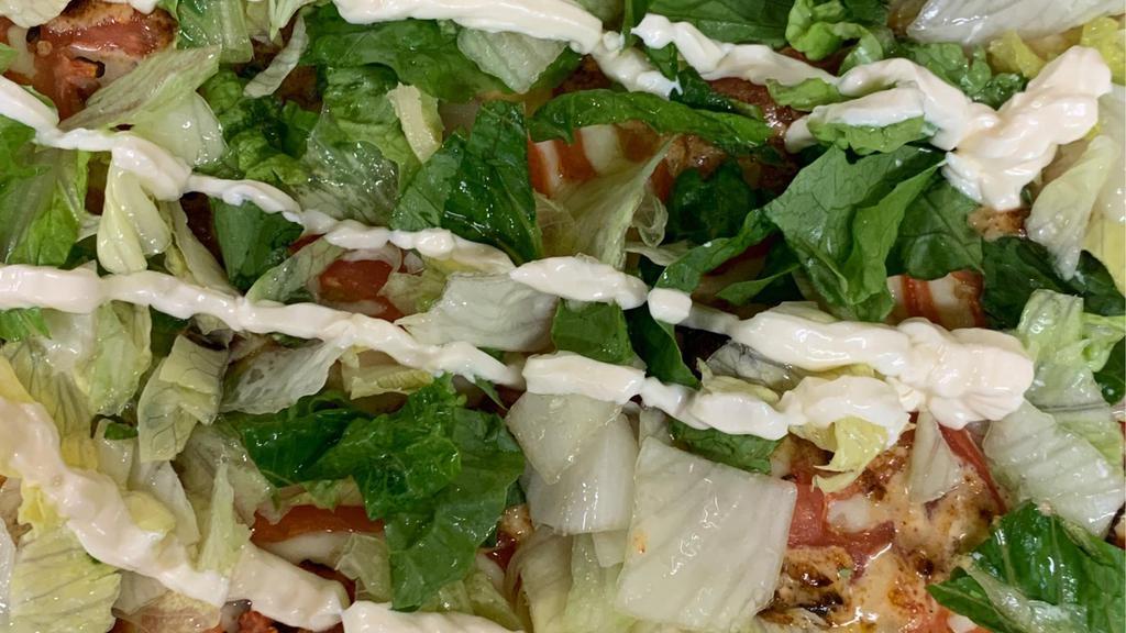 Blt Pizza · Enjoy a Bacon, Tomato, and Lettuce Pizza with your choice of sauce.