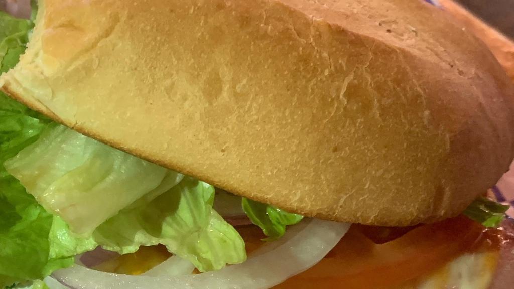 Ham & Cheese Sub · Ham, your choice of cheese, with lettuce, tomatoes, onions and mayo toasted on an 8 inch sub bun.