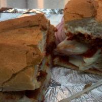 Meatball Sub · Our All New Meatball Sub has pizza sauce, meatballs, diced onions and provolone cheese melte...