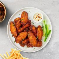 Chicken Wings  · Fresh chicken wings breaded and fried until golden brown.