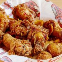 Fried Chicken Wings (7) · With cajun fries and hush puppies.