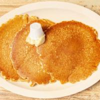 Stack Of 3 Pancakes Griddle · Hot off the griddle, butter and syrup.