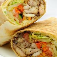 Shawarma Sandwich · The thin slices of meat grilled on the flame.