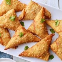 Samosa · Chicken or veggie come with two pieces