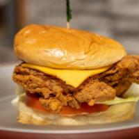 Chicken Zinger Burger · Crispy fried chicken with lettuce, tomato, cheese, mayonnaise, and ketchup in a burger bun.