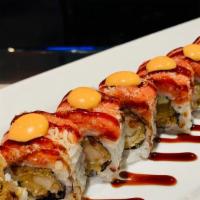 Red Head · Shrimp tempura and cucumber inside, topped with spicy crunchy tuna, spicy mayo, eel sauce.