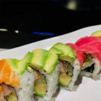 Rainbow · Crabmeat, avocado, cucumber, topped with tuna, salmon, white fish.