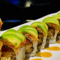 Samural · Shrimp tempura and spicy tuna inside, topped with spicy crab, avocado.