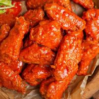 10 Buffalo Wings · Served with blue cheese or ranch and a side of fries!