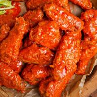 30 Buffalo Wings · Served with blue cheese or ranch and a side of fries!
