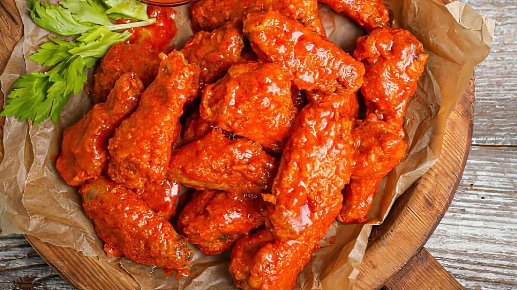 30 Buffalo Wings · Served with blue cheese or ranch and a side of fries!