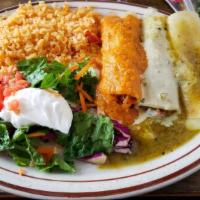 New Shrimp Enchiladas · 3 cheese enchiladas topped with shrimp , fresh spinach, and mushrooms, served with rice , ho...