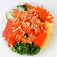 Sake Poke · Spicy. Salmon, cucumber, shredded carrot, pineapple, masago, kanikama, seaweed salad, crunch...
