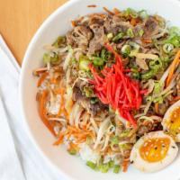 Gyūdon (Beef) Rice Bowl · Savory and juicy sliced beef with onion, beansprout, and shredded carrot served over steamed...