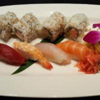 Sushi Lunch Combo · choice of Spicy Salmon, California or Veggie roll, with assorted nigiri & cup of Miso soup.
...