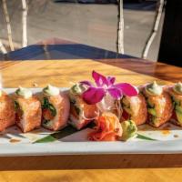 Pink Panther · tuna, yellowtail, salmon,
cilantro, avocado, cucumber
wrapped in soy paper, then
topped with...