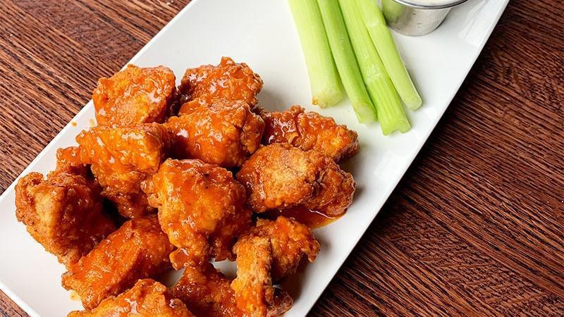 Boneless Wings Appetizer · hand-breaded, buttermilk-fried boneless wings tossed with one of our signature sauces.
