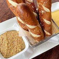 Pretzel Sticks Appetizer · soft salted pretzel sticks served with our house-made, northern lager-infused cheese sauce a...