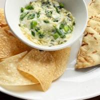 Spinach & Artichoke Dip Appetizer · creamy spinach, artichoke and parmesan dip. served with grilled naan bread and crispy tortil...