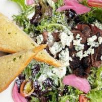 Top Sirloin Salad · grilled top sirloin on a bed of arcadian greens tossed in bleu cheese dressing with grape to...