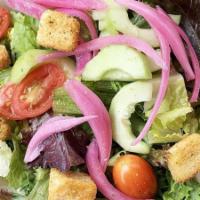 House Salad · Romaine lettuce, arcadian greens, sliced grape tomato, cucumber, pickled red onion, and crun...